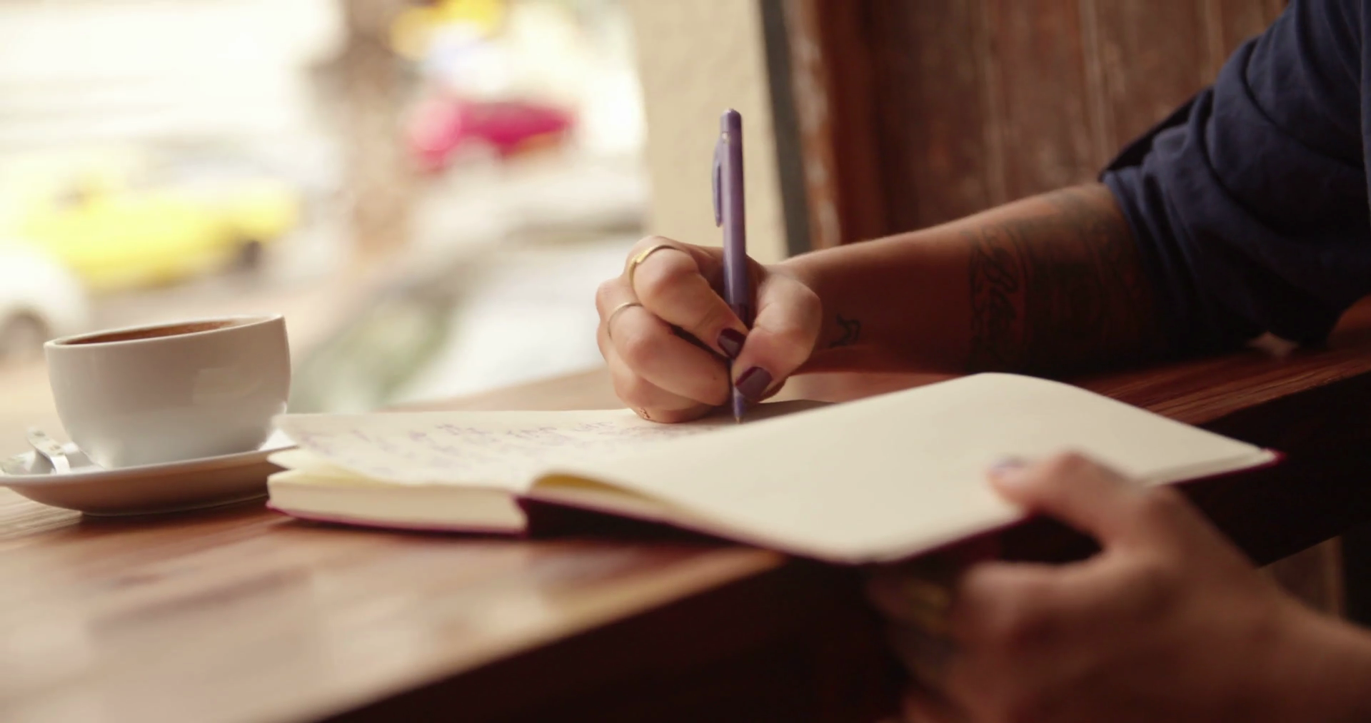 close up of woman writing
