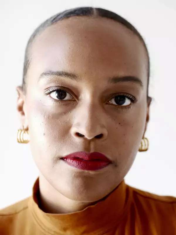 image of a short haired woman looking directly into the camera
